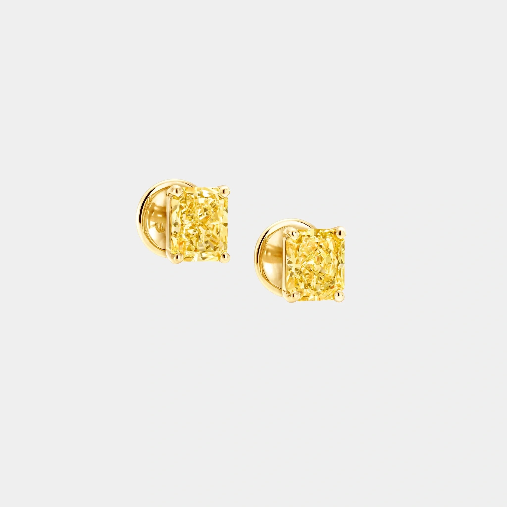 Fancy Intense Yellow Radiant Cut Diamond Stud Earrings